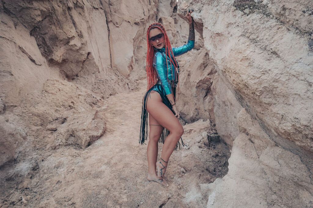 Model in a sandy canyon — Czech desert, Burning Man inspired photo