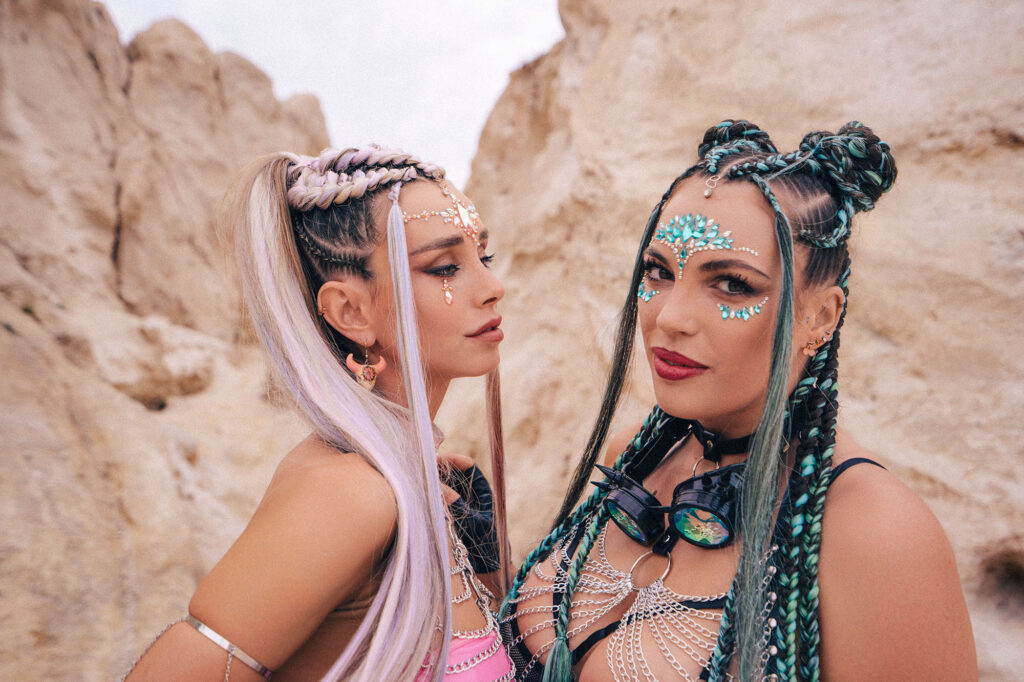 Two models in festival costumes — Burning Man series