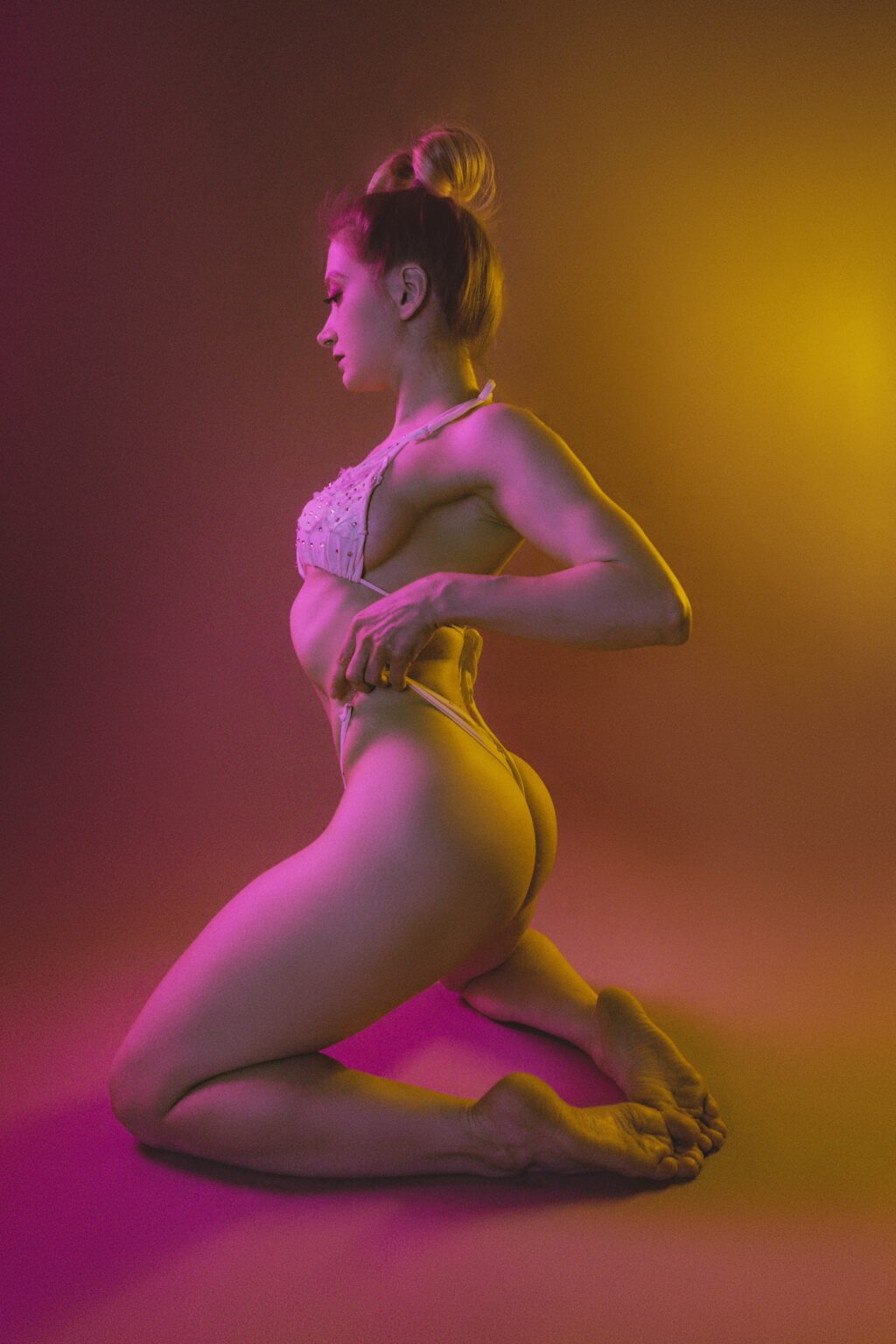 Goddess Isabelle in warm orange and pink light